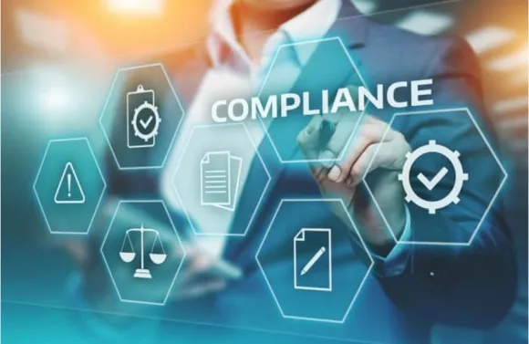 a virtual screen showcases the word 'compliance'